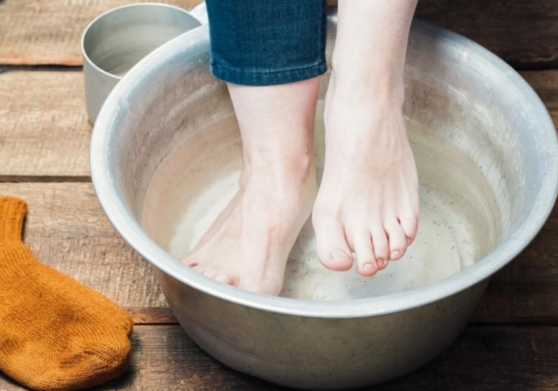 Soaking feet in water to lower blood pressure
